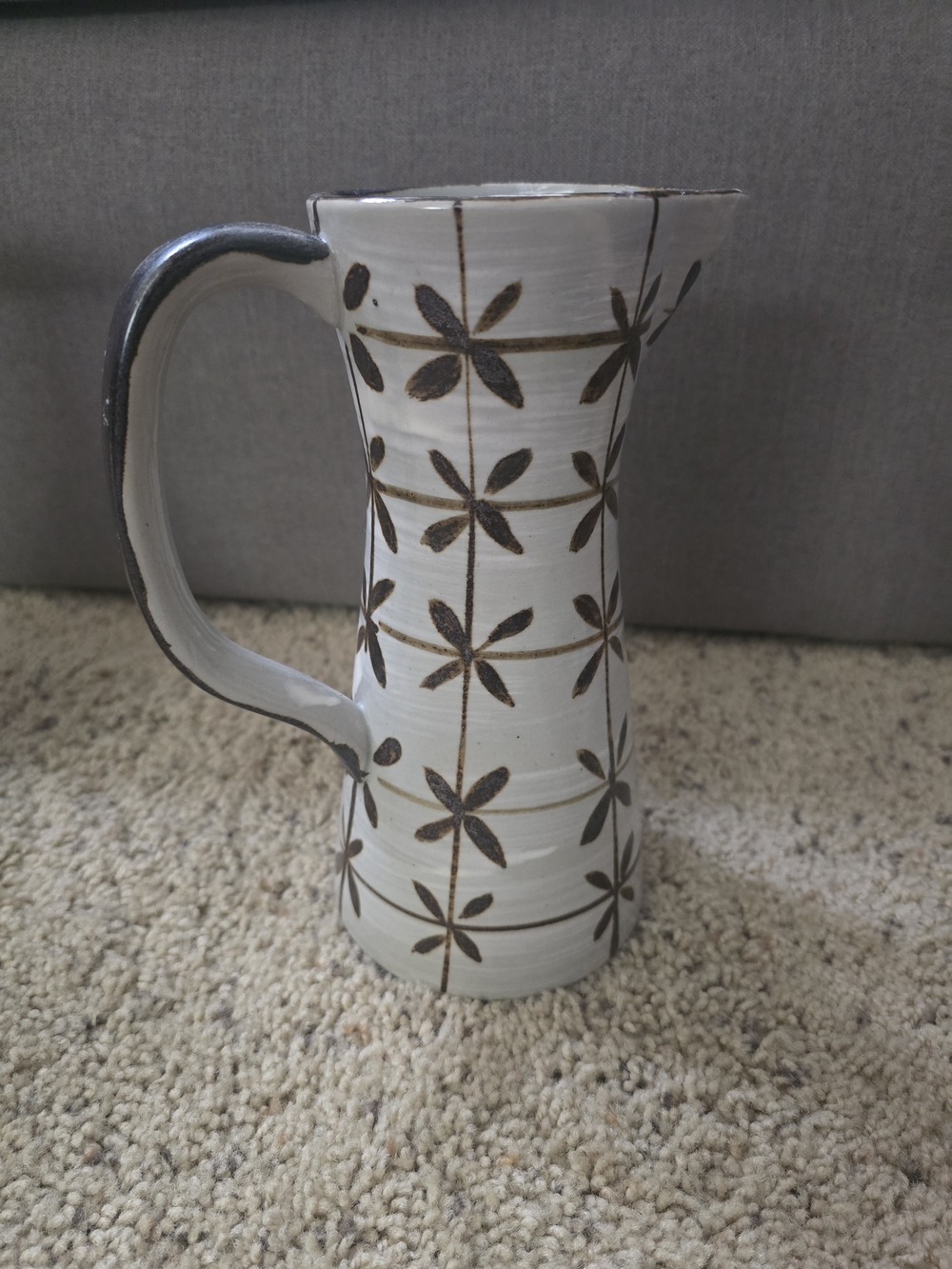 Handcrafted White Ceramic Pitcher with Brown Floral Pattern